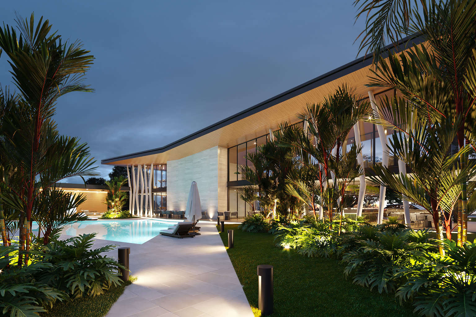 Casa club de Moriáh de día, entre palmeras y jardines