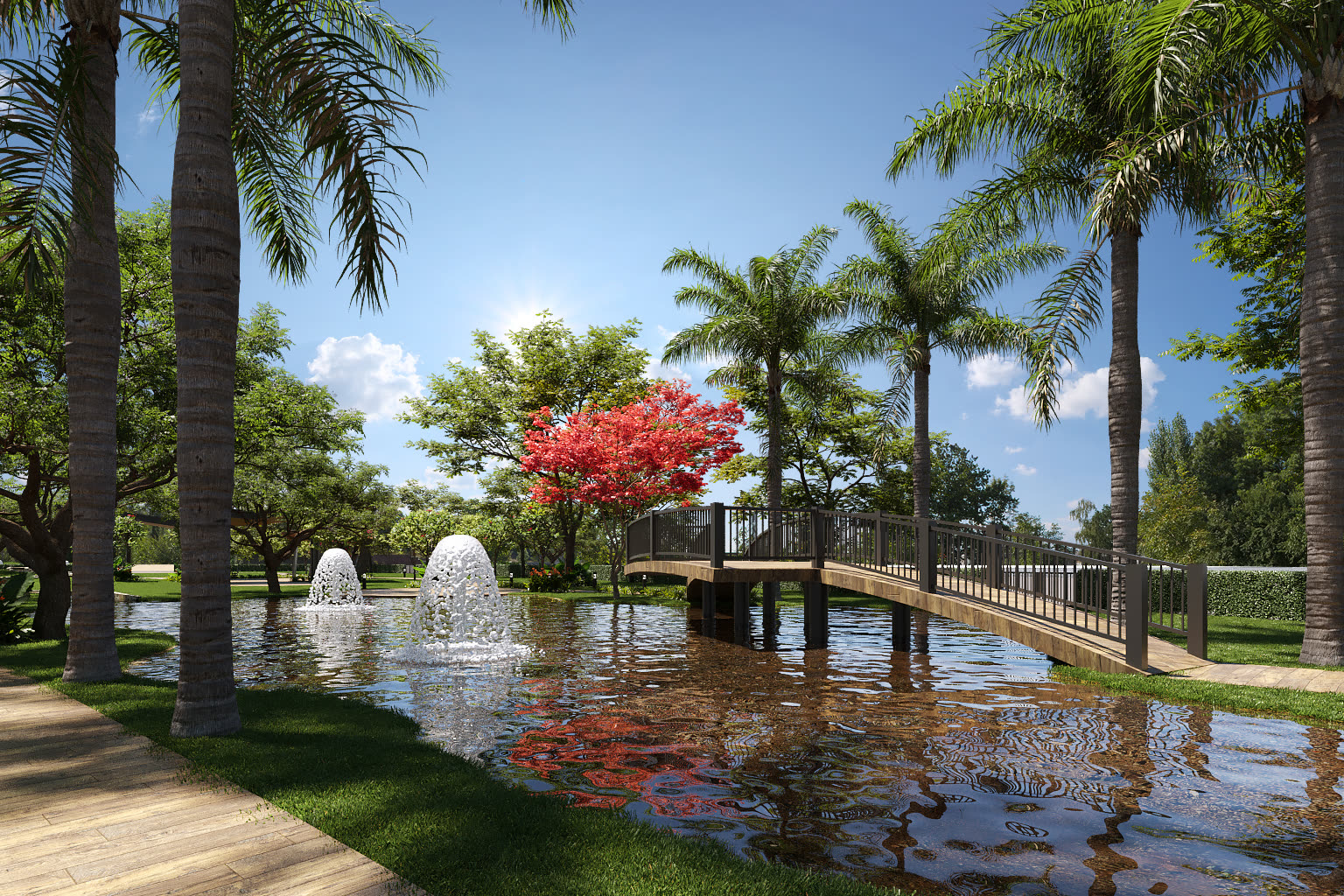 Espejo de agua con fuentes y palmeras dentro del conjunto