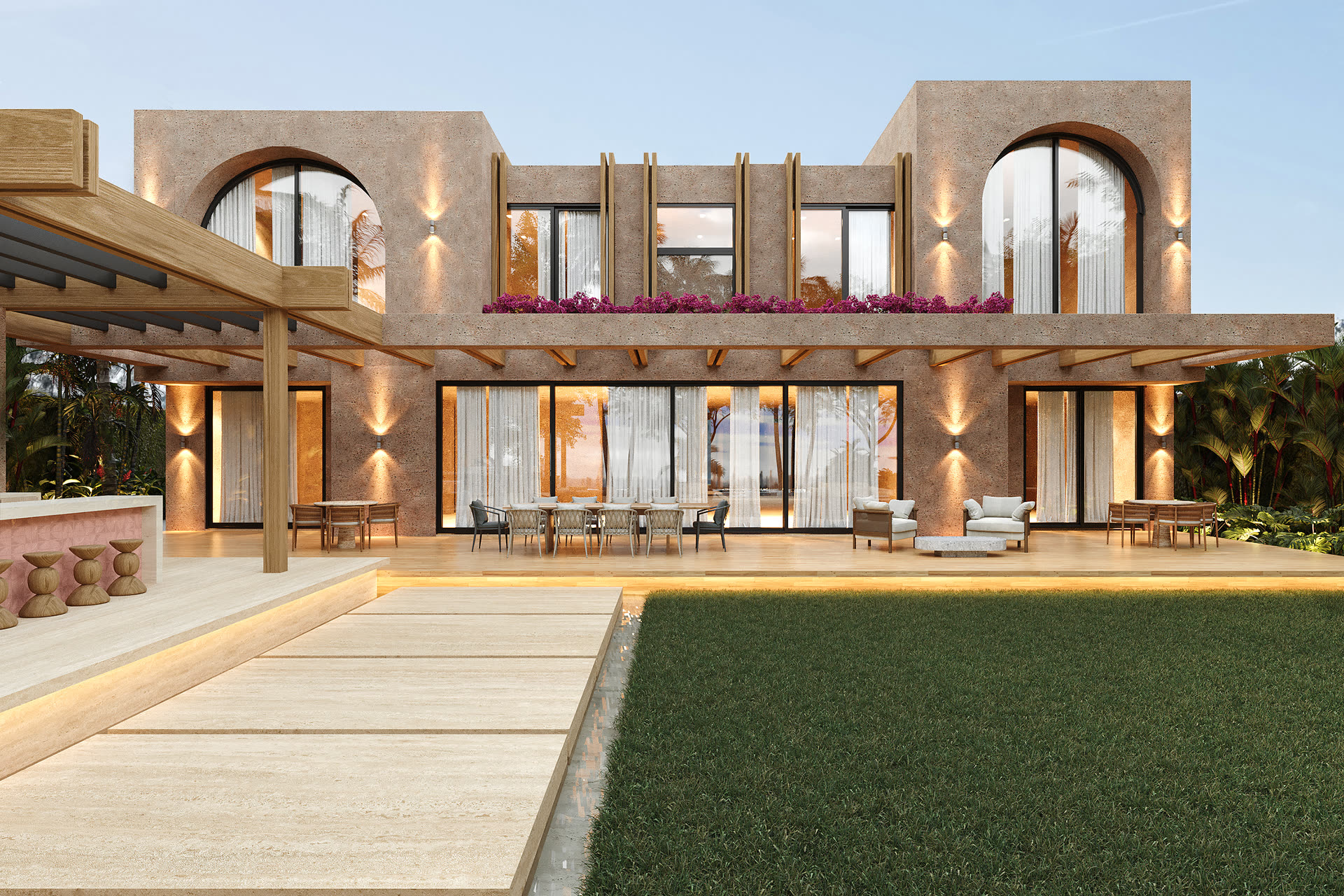 Fachada posterior del proyecto Punta Cana con arcos de piedra caliza, buganvilla y terraza