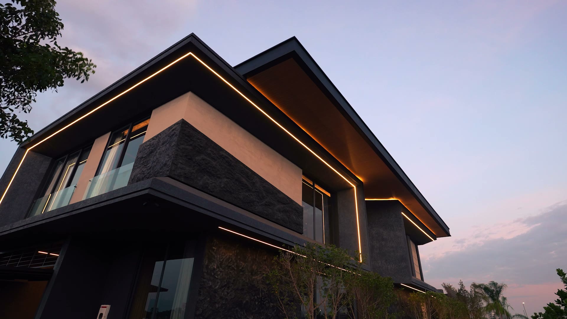 Facade of the house at dusk, first frame of the video walkthrough